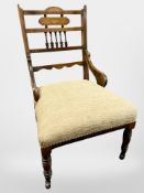 A Victorian rosewood and satinwood inlaid occasional chair