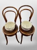 A pair of Bentwood chairs together with two chamber pots