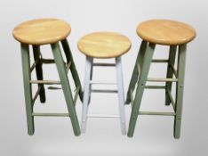 Two contemporary painted pine bar stools together with one other