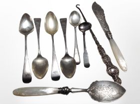 A group of Georgian and later silver spoons and other items.