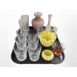 A group of glassware including vases, set of six crystal tumblers, two-tone glass basket, etc.