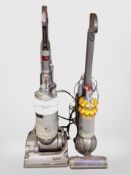 Two Dyson upright vacuums