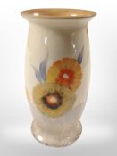 A Clarice Cliff Bizarre flared vase made by Wilkinson Ltd, height 15cm.