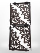 Four cast-iron wall brackets, length 28cm.