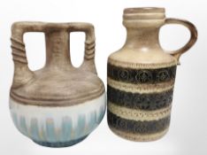 A West German pottery jug and further twin-handled vase,
