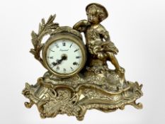 A gilt metal figural mantel clock, the dial signed Imperial, striking on a bell, with key,