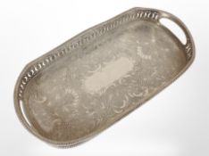 A silver-plated pierced and engraved gallery tray, width 32cm.