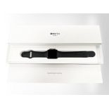 An Apple watch series 3, Space Gray aluminum Black Sport, in box with instructions,