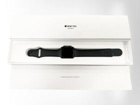 An Apple watch series 3, Space Gray aluminum Black Sport, in box with instructions,
