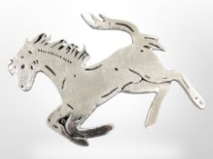 A cast-aluminium prancing horse plaque, length 53cm.