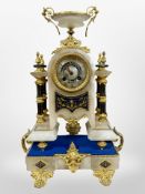A 19th century French alabaster and gilt metal mantel clock, striking on a bell, with key,