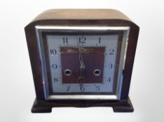 A Smith's Enfield Art Deco oak mantel clock,