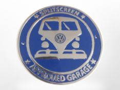 A cast-aluminium VW plaque, diameter 25cm.