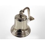 A ship's-style bell in brass finish, height 21cm.