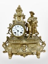 A 19th century French gilt metal figural mantel clock, striking on a bell, with pendulum and key,