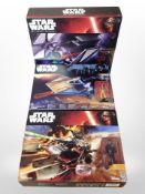 Three Hasbro Disney Star Wars figures, boxed.