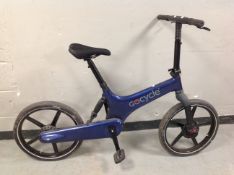 A Go-Cycle electric folding bike,