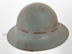 A 20th-century military tin helmet.