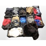 Twelve crates of assorted clothing, furs,