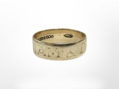 A 9ct gold band ring with inscription CONDITION REPORT: 2.