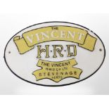 A cast-iron Vincent plaque, width 29cm.