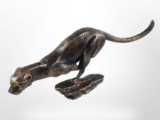 A cast-iron figure of a cheetah, length 30cm.