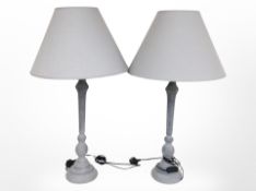 A pair of contemporary table lamps with shades,