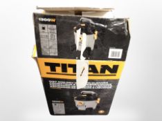 A Titan wet and dry vacuum cleaner in box