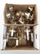 Two boxes of continental chandelier light fittings.