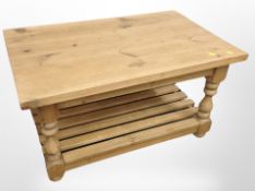A contemporary pine rectangular coffee table,
