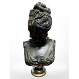 A patinated and gilt bronze bust of a lady, height 34cm.