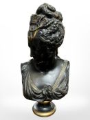 A patinated and gilt bronze bust of a lady, height 34cm.