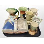 A group of Art Deco ceramic vases, jugs, and a basket including Wade, Czechoslovakian, etc.