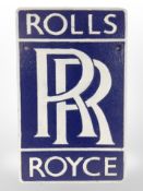 A cast-iron Rolls-Royce plaque, length 29cm.