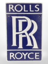 A cast-iron Rolls-Royce plaque, length 29cm.