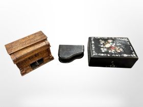 A Victorian papier maché and mother of pearl jewellery box, a miniature model pedal organ,