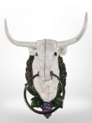 A cast-iron cow head, length 30cm.