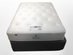A 4'6 storage divan set with Rest Assured mattress