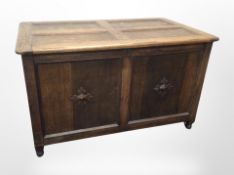 A Victorian panelled oak blanket chest,