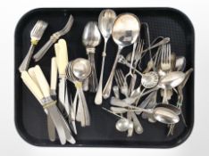 A collection of EPNS and stainless steel flatware.