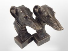 A pair of cast-iron greyhound busts, height 22cm.