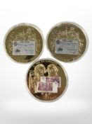 Three gilt coins commemorating British bank notes, diameter 48mm.