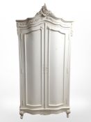 A French style painted double door armoire,