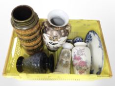 A box containing West German pottery stick pot, five further vases, and a blue and white meat plate.
