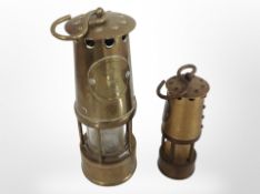 Two miniature brass miner's lamps, tallest 14cm.