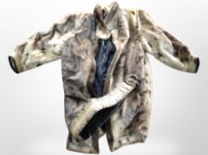 A Greenland seal fur coat and a snakeskin belt.