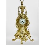 An impressive 19th century Rococo Revival gilt metal eight day mantel clock, striking on a bell,