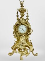 An impressive 19th century Rococo Revival gilt metal eight day mantel clock, striking on a bell,