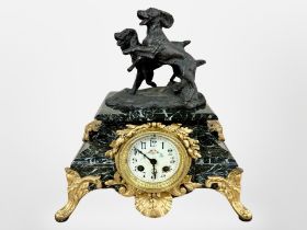 A 19th century green marble and gilt metal eight day mantel clock, later surmounted by two dogs,