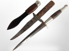 A Commando-style knife, length 30cm, and two further knives.